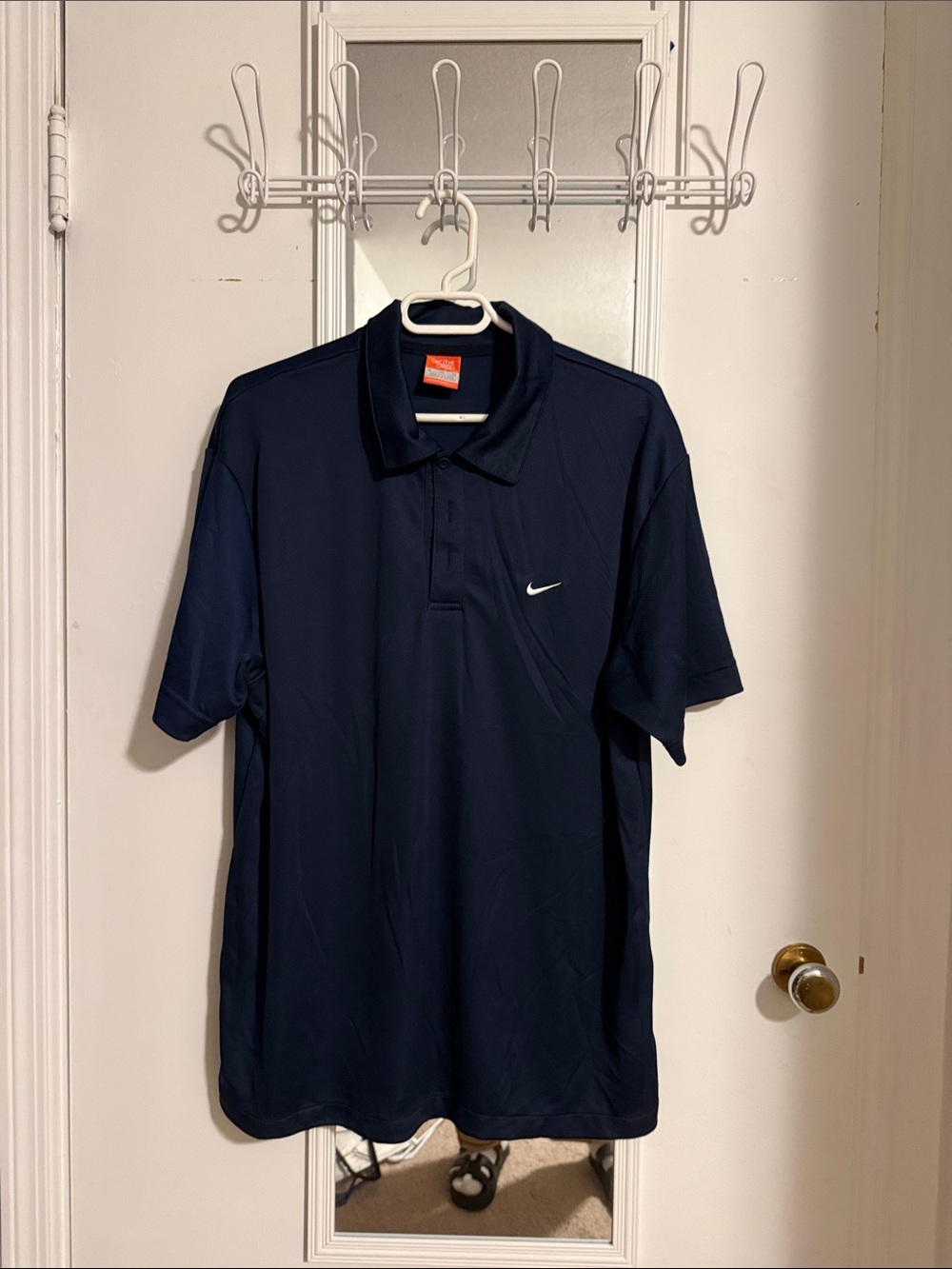 Nike Men’s Dark Navy Polo with White Swoosh